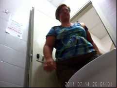Huge ass woman goes pee in public WC