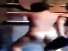 Party girls dancing and stripping on stage