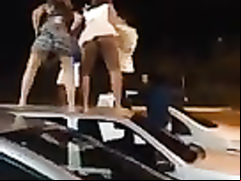 Fetching Brazilian sweeties dancing on the top of the car