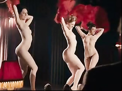 Cabaret performers get naked and dance on the stage