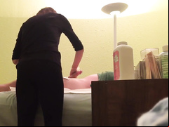 Hidden cam reveals a wax master giving handjob to horny client