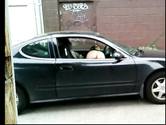 Naked hooker gives blowjob in the car and gets filmed
